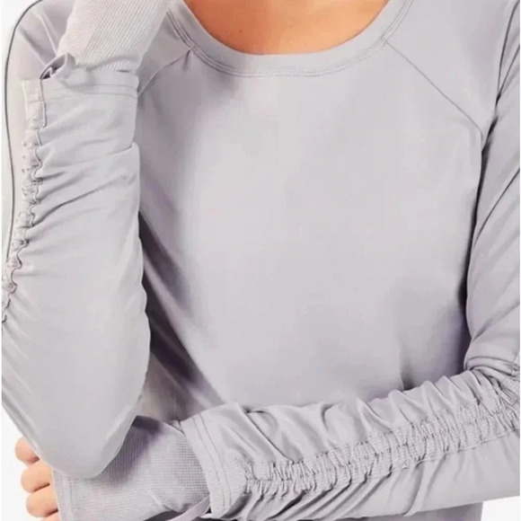 Fabletics | Cashel Adjustable Sleeve Top II Gray Cinch Sleeve Thumbholes - Picture 3 of 10